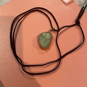 Stone pendant on a rope necklace